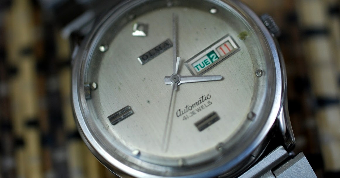 olma watch company history