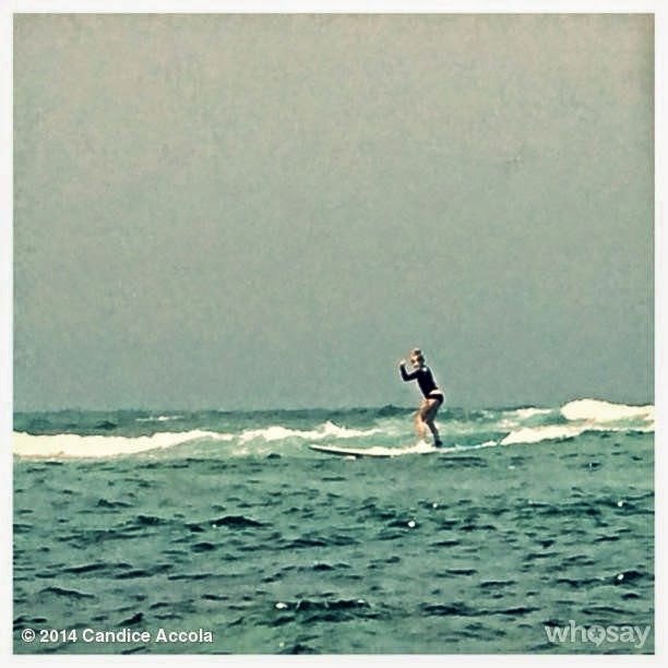 Retro Bikini: Candice Accola plays Football at Hawaii in a Colorful Bikini