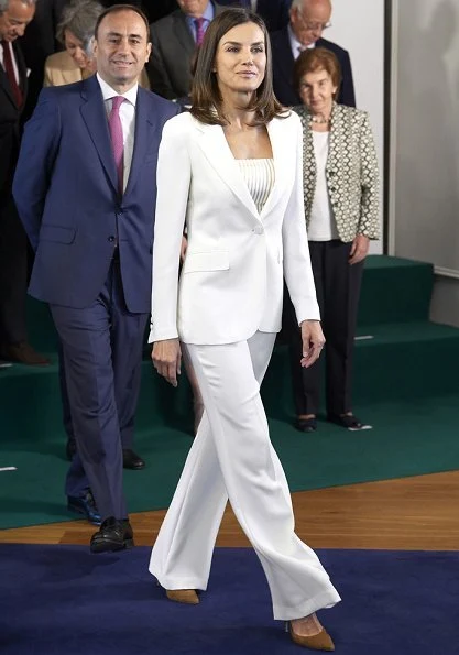 Queen Letizia looked radiant in white, debuting a crisp wide leg pantsuit by Carolina Herrera