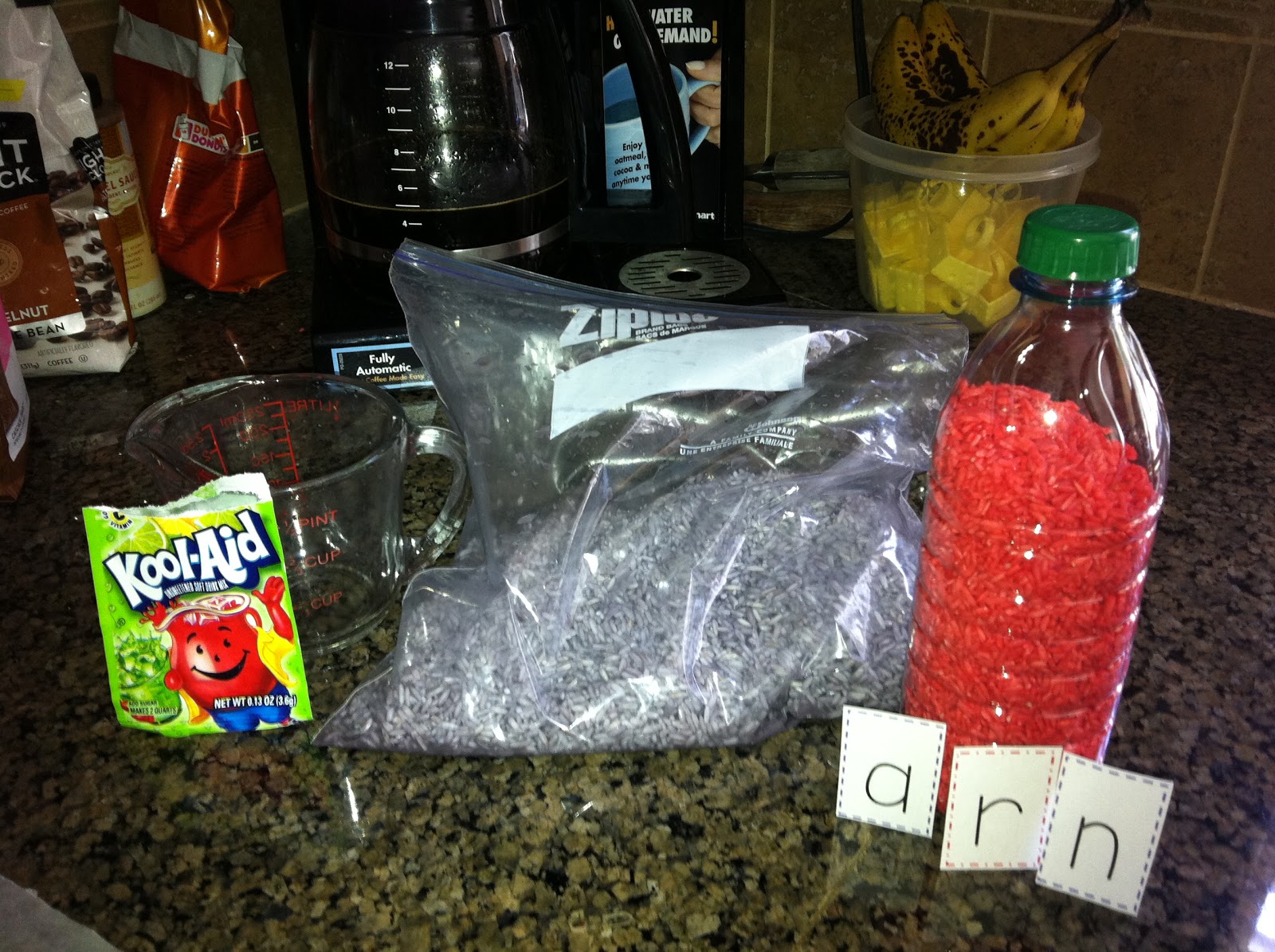 Class full of "Special" Kiddos Kool Aid colored rice bottles