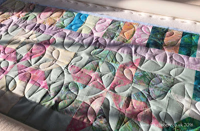 Jelly Roll quilt with 'Ginger Stars' pantograph
