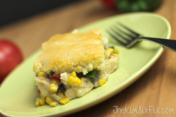 Easy Bisquick topped Tex-Mex chicken pot pie with the mexican flavors of black beans, peppers and corn. Easy to make.