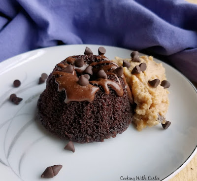 mini chocolate bundt cake with peanut butter whipped cream and mini chocolate chips