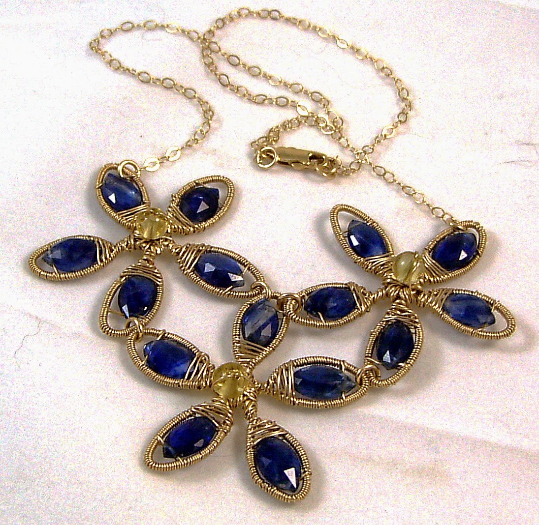 https://www.etsy.com/nz/listing/57643706/blue-kyanite-and-gold-flower-necklace?ref=shop_home_active_13