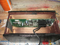 Display board seated into the case bottom