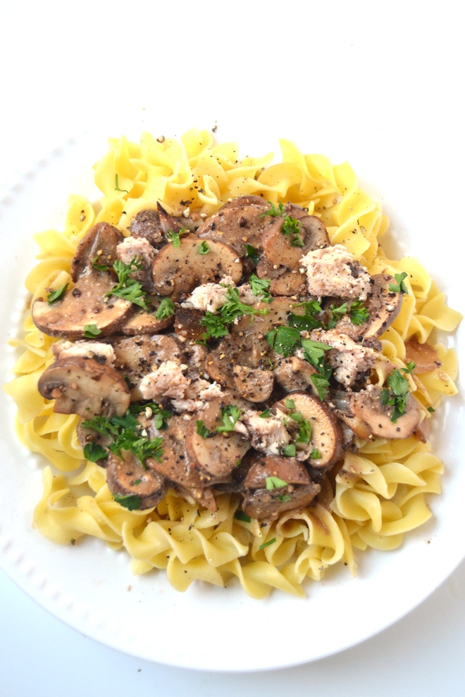 Healthier Sardine Stroganoff features sauteed mushroom, onions and garlic with a Greek yogurt based balsamic-wine sauce and omega-3 rich sardines served over egg noodles! www.nutritionistreviews.com