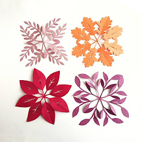 Four leafy paper snowflake designs