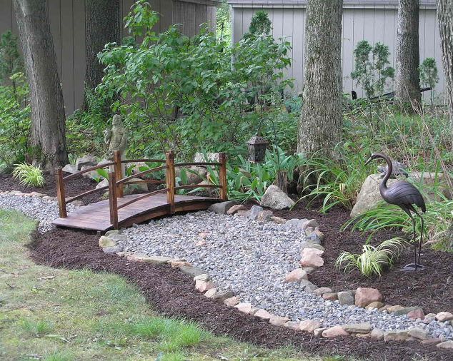 Inspiration Ideas on how to control water runoff and how to create a dry river creek bed.