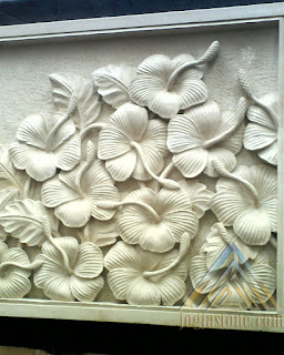 Relief batu alam paras jogja atau batu alam paras putih motif relief bunga sepatu
