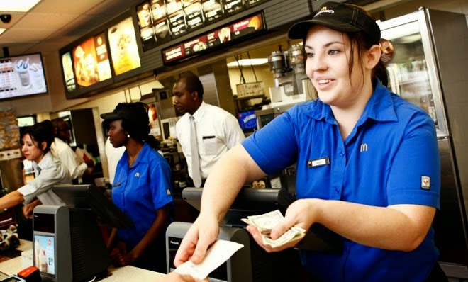 Woman working minimum wage job