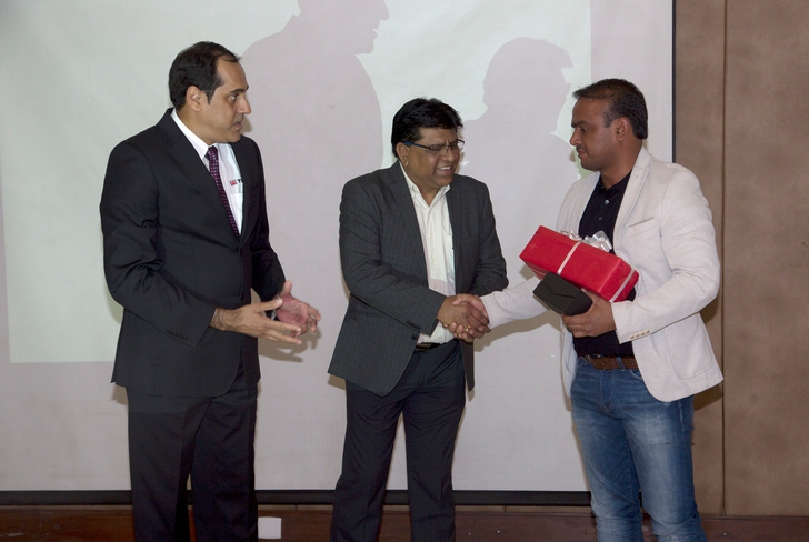 Terex Explorer 5800 all terrain crane (220 ton) Terex Cranes India's Saeesh Nevrekar (left) and Narendra Wahile (center) congratulating H N Construction's Vidyanand Singh