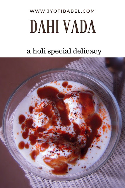 Dahi Vada is one of the must prepare dishes for Holi. Soft urad dal dumplings paired with yoghurt and garnished with tamarind chutney and dahi vada masala.