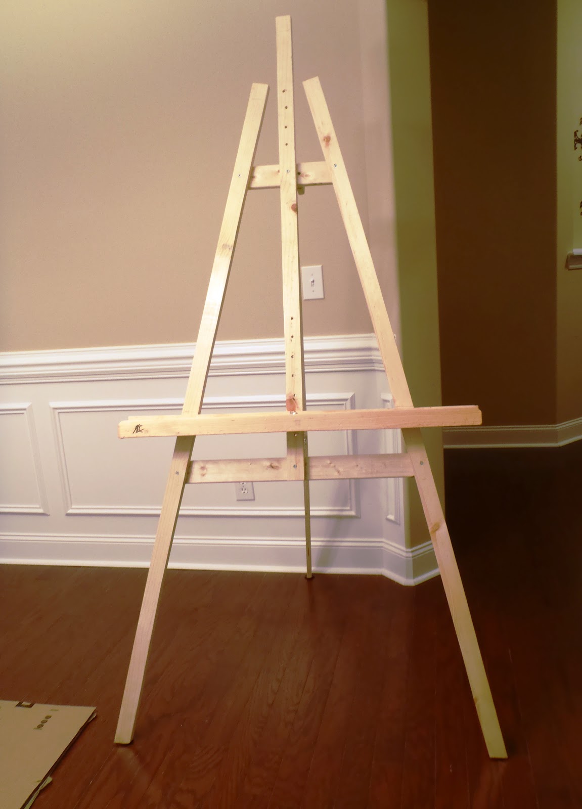 Easels are just three-legged stand but are expensive when buying the 