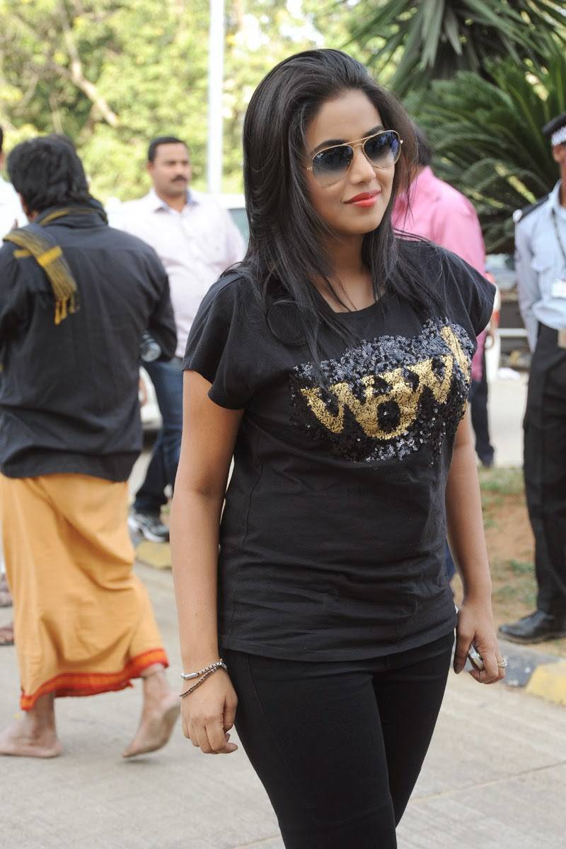 Tollywood Actress Poorna In Black T Shirt Jeans Glass