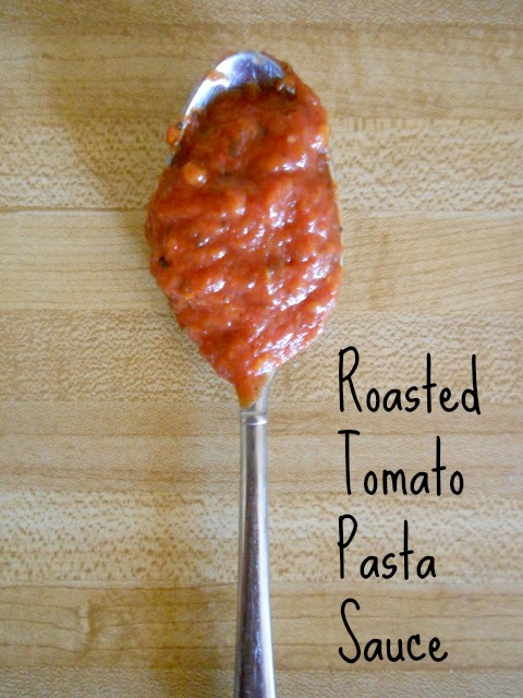 A spoonful of roasted tomato sauce on sitting on the counter.