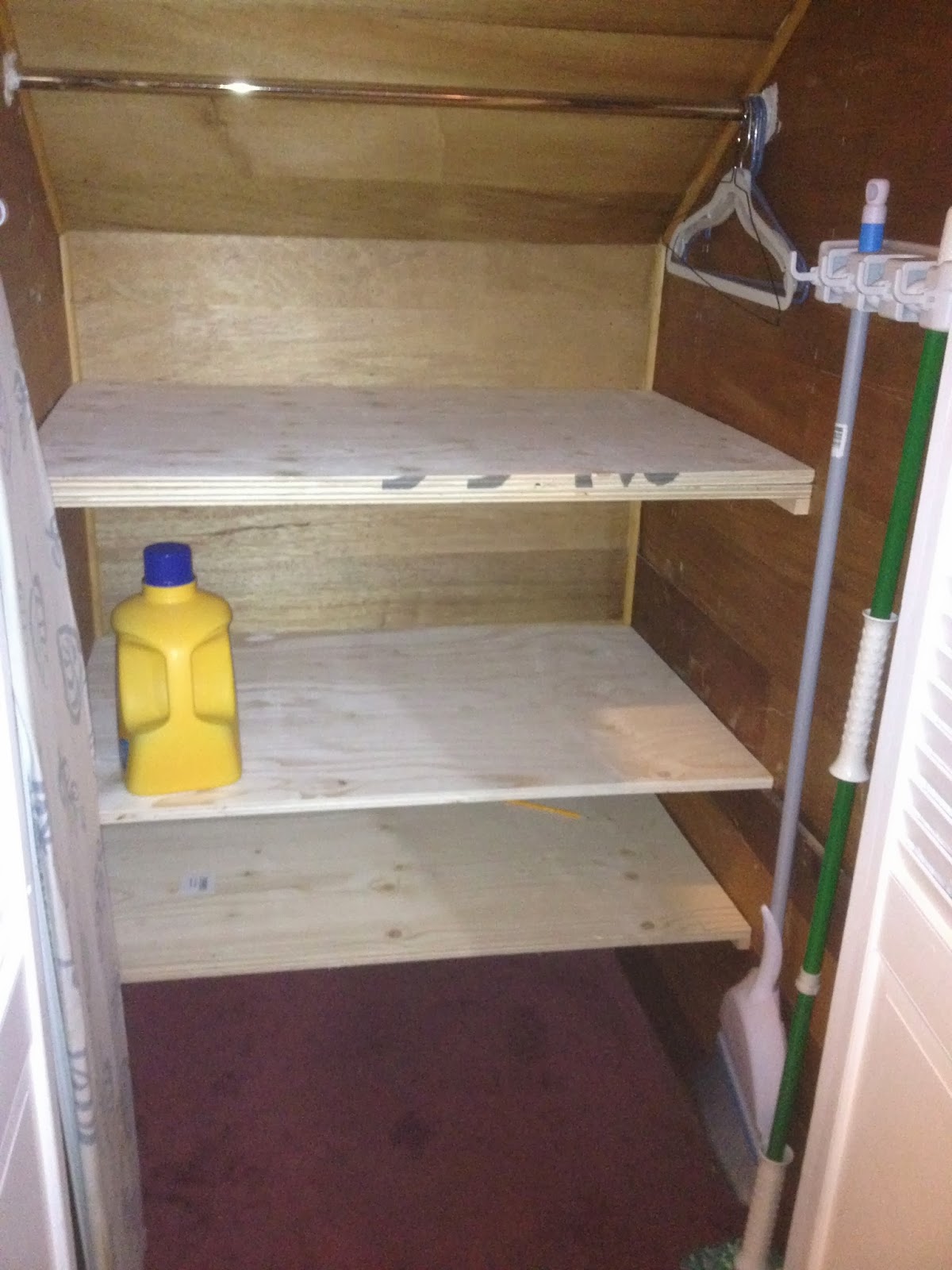 Stylish meets Organized Part 1 Under the Stairs Linen Closet