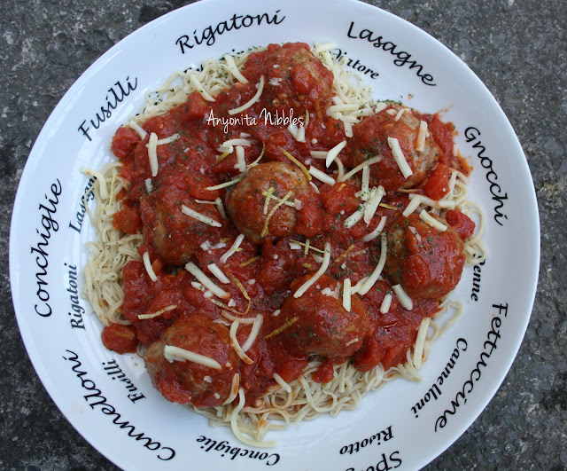A serving dish of DIY spaghetti, turkey meatballs and tomato sauce from www.anyonita-nibbles.com