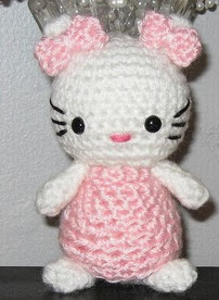 http://www.ravelry.com/patterns/library/amigurumi-crocheted-kitty