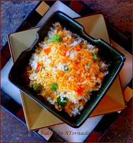 Easy Rice with Vegetables Casserole, a simple side dish put together in minute with cooked rice and chopped vegetables. A great compliment to any meal | Recipe developed by www.BakingInATornado.com | #recipe #dinner