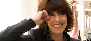 photo of Nora Ephron smiling at the camers