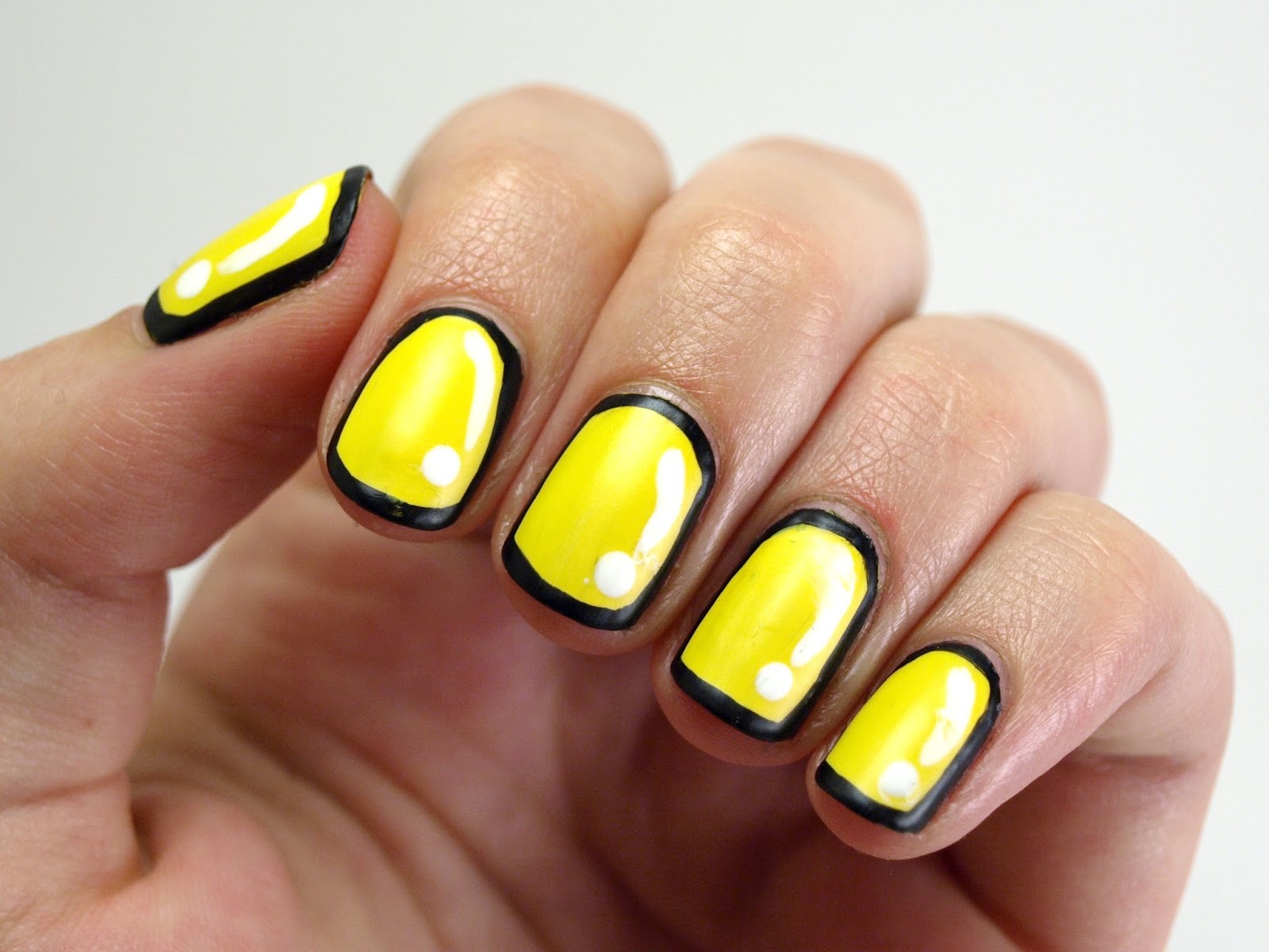nail design with yellow