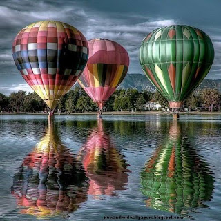 Beautiful Balloons Falling On Water Hd Wallpapers For Android
