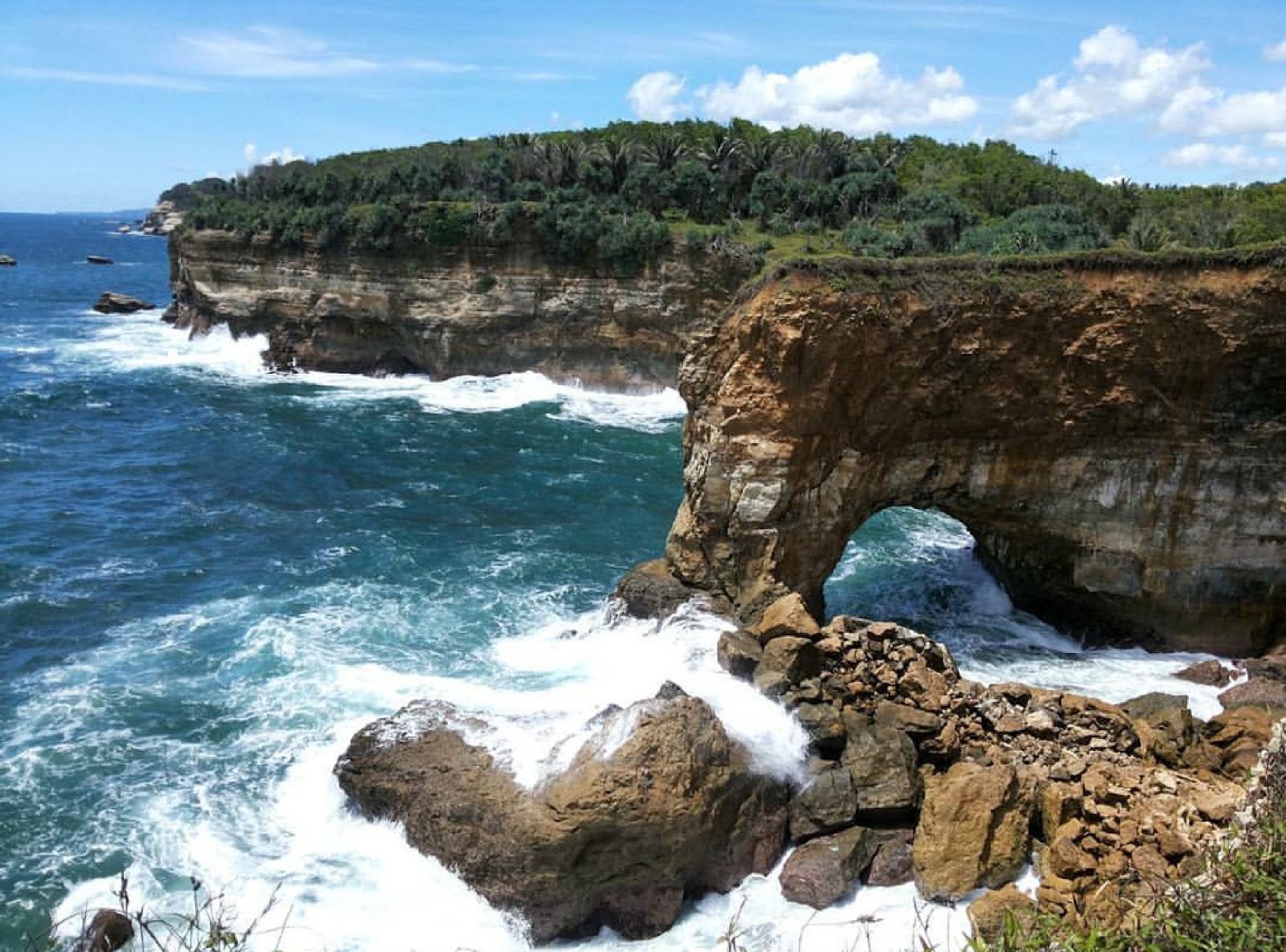 Image result for Pantai Karang Bolong, Pacitan