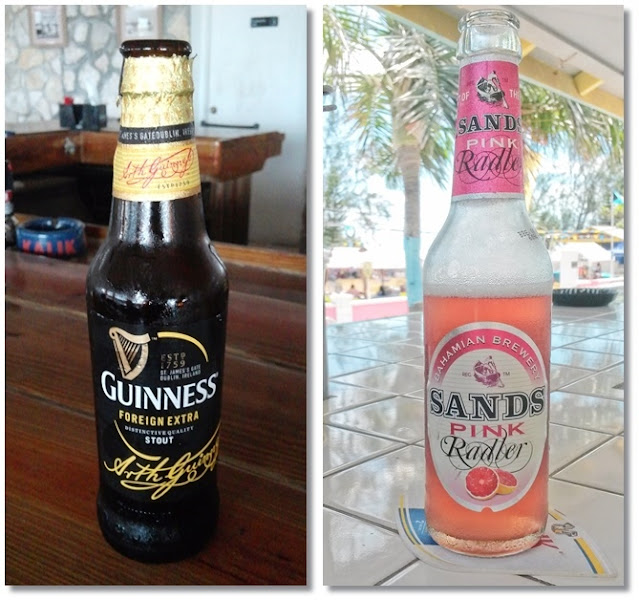 A bottle of Guinness Foreign Extra, A bottle of Sands Pink Raddler.