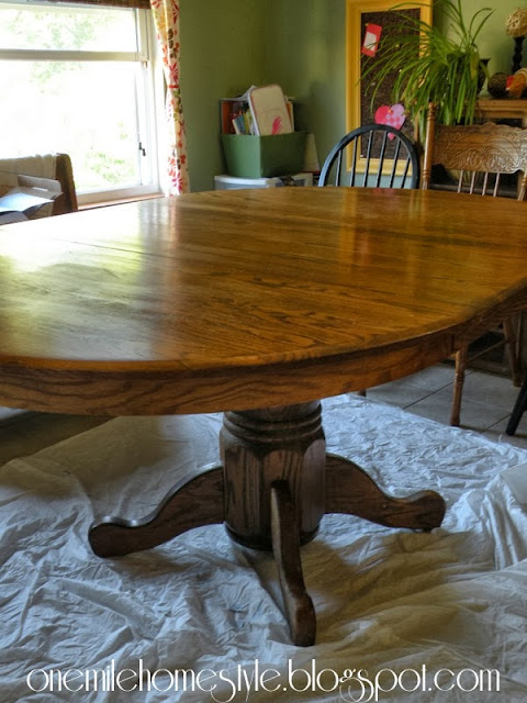 Round oak dining room table - before