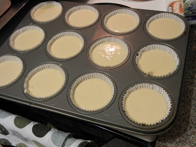 cupcake batter in a muffin pan 