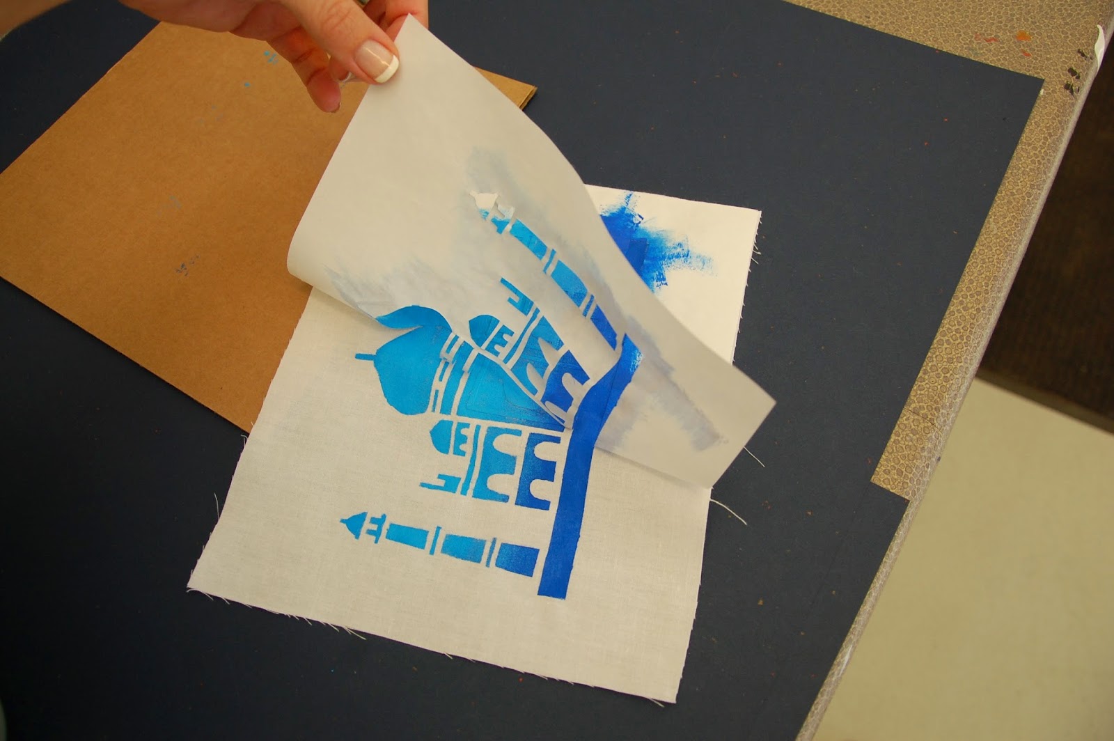 AHS Screen Printing "Printing" the freezerpaper stencil