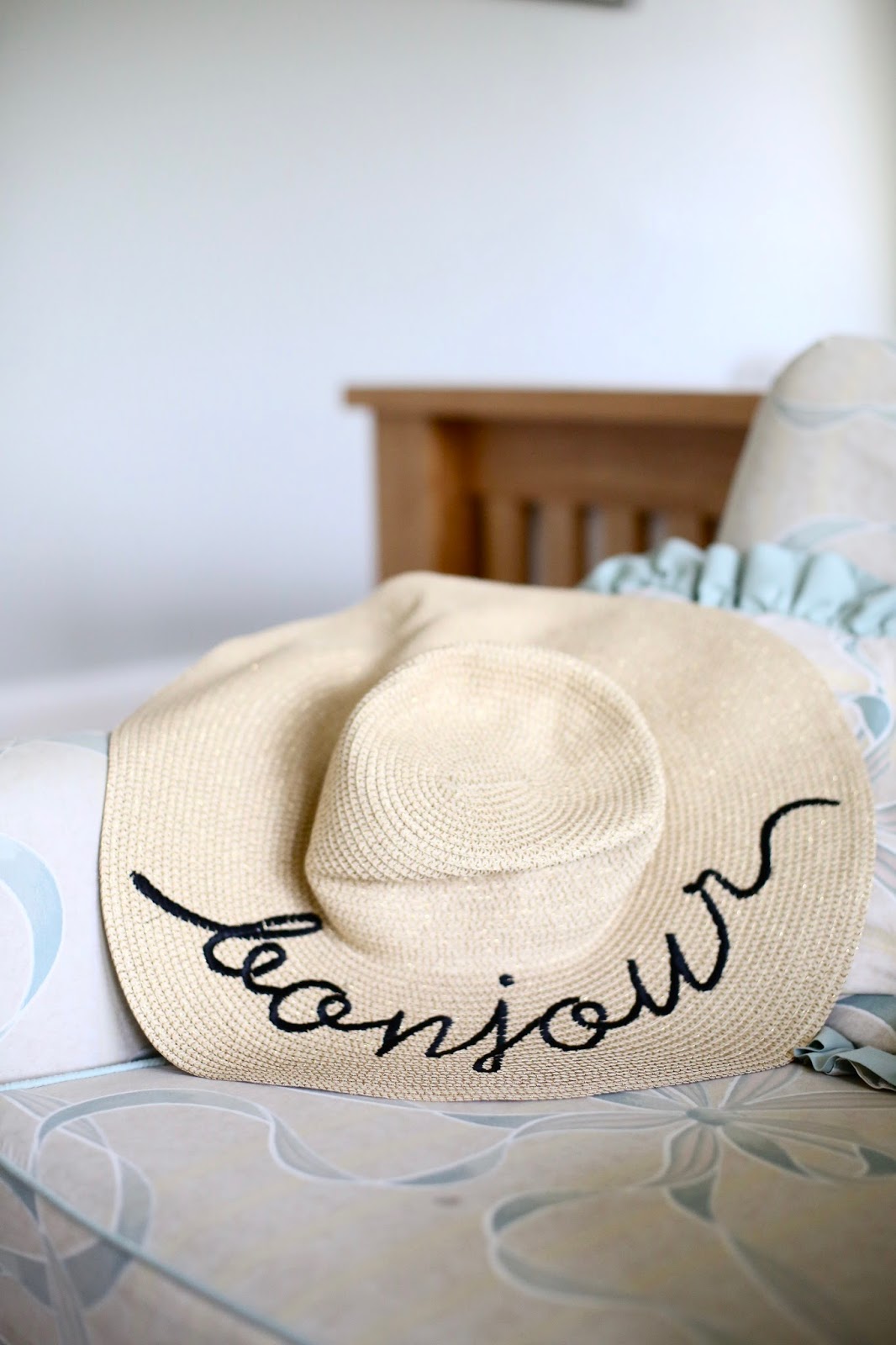 floppy hat with writing on