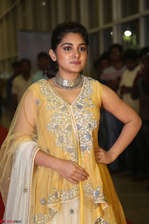 Nivetha Thamos in bright yellow dress at Ninnu Kori pre release function ~  Exclusive (5)