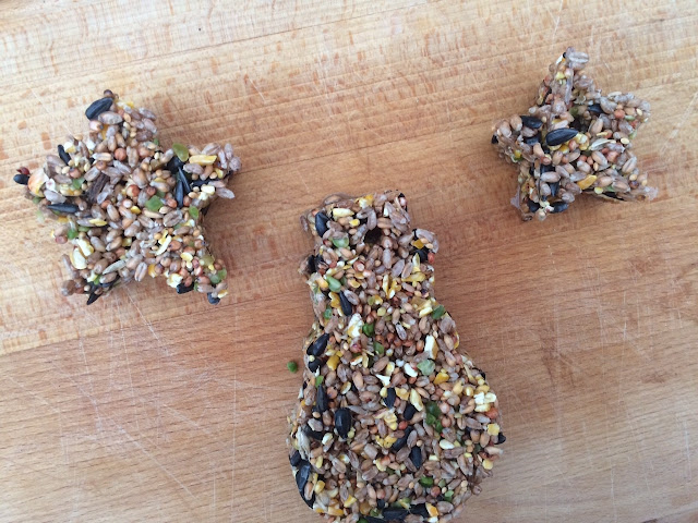 Bird seed set in shapes of a snowman and stars