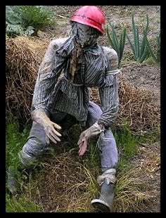 hanging man scarecrow easily crafted from old clothes and stuffed for free with leaves old newspaper or other materials youve been planning to discard