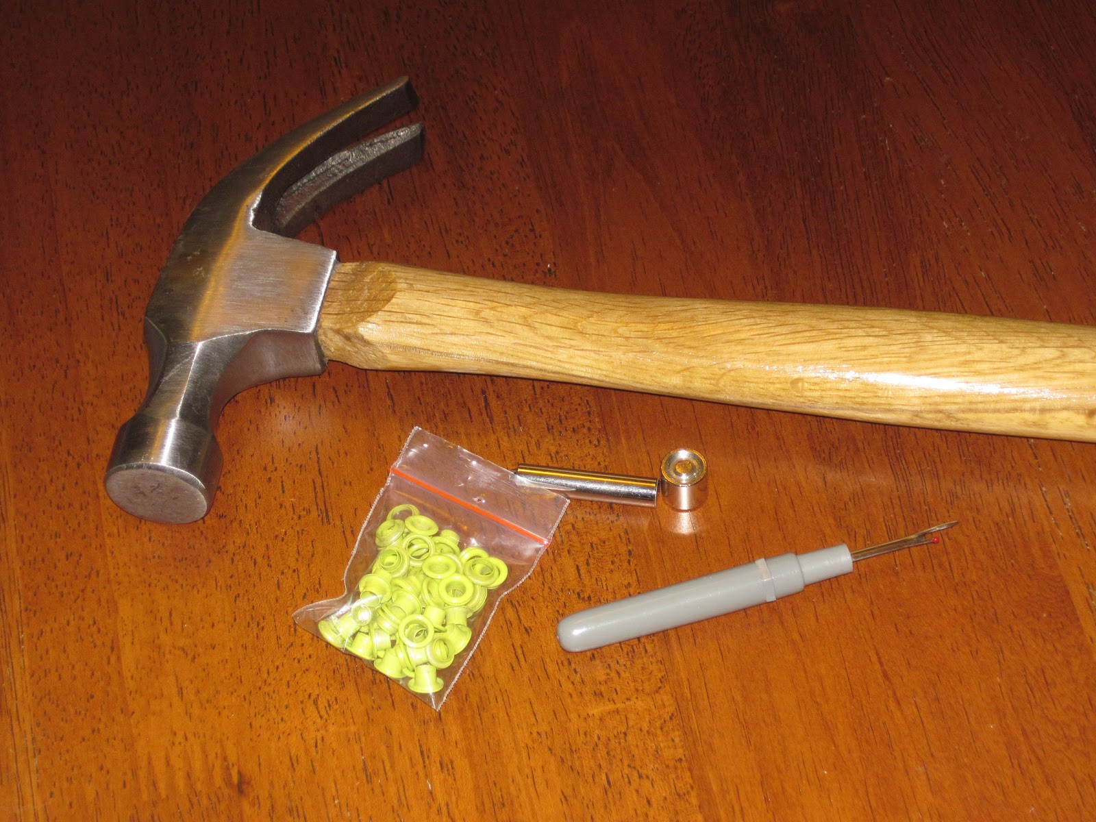 That is all it took... How to put in Grommets/Eyelets into Fabric