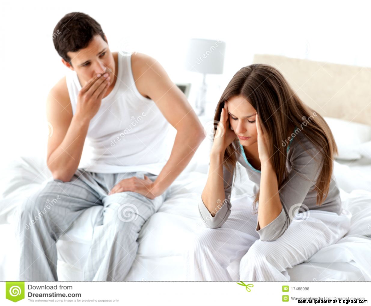 Worried Man Looking At His Wife Having A Headache Royalty Free