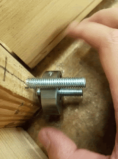 the author using a die to reform any smashed threads on the bolt