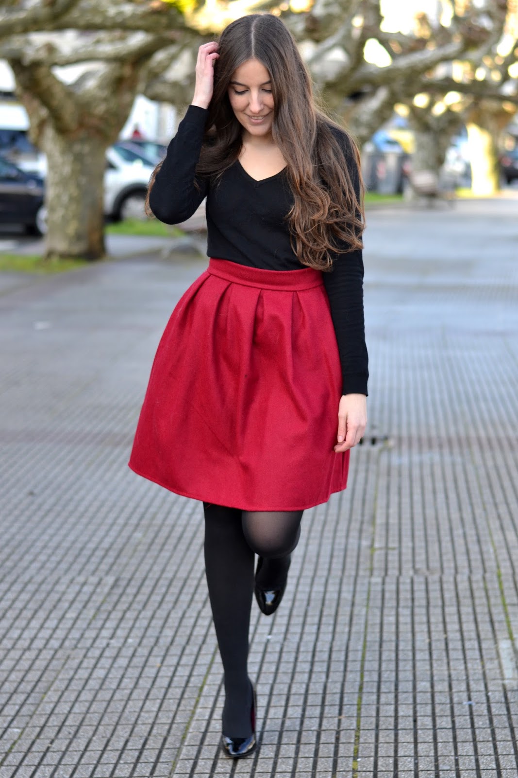 red midi skirt, black heels