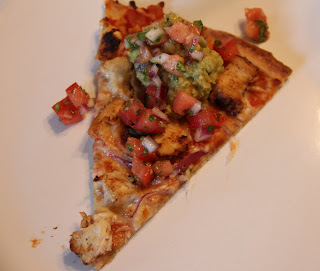 slice of chicken burrito pizza on white plate