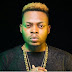 Olamide Proposes To His Baby Mama On Her Birthday