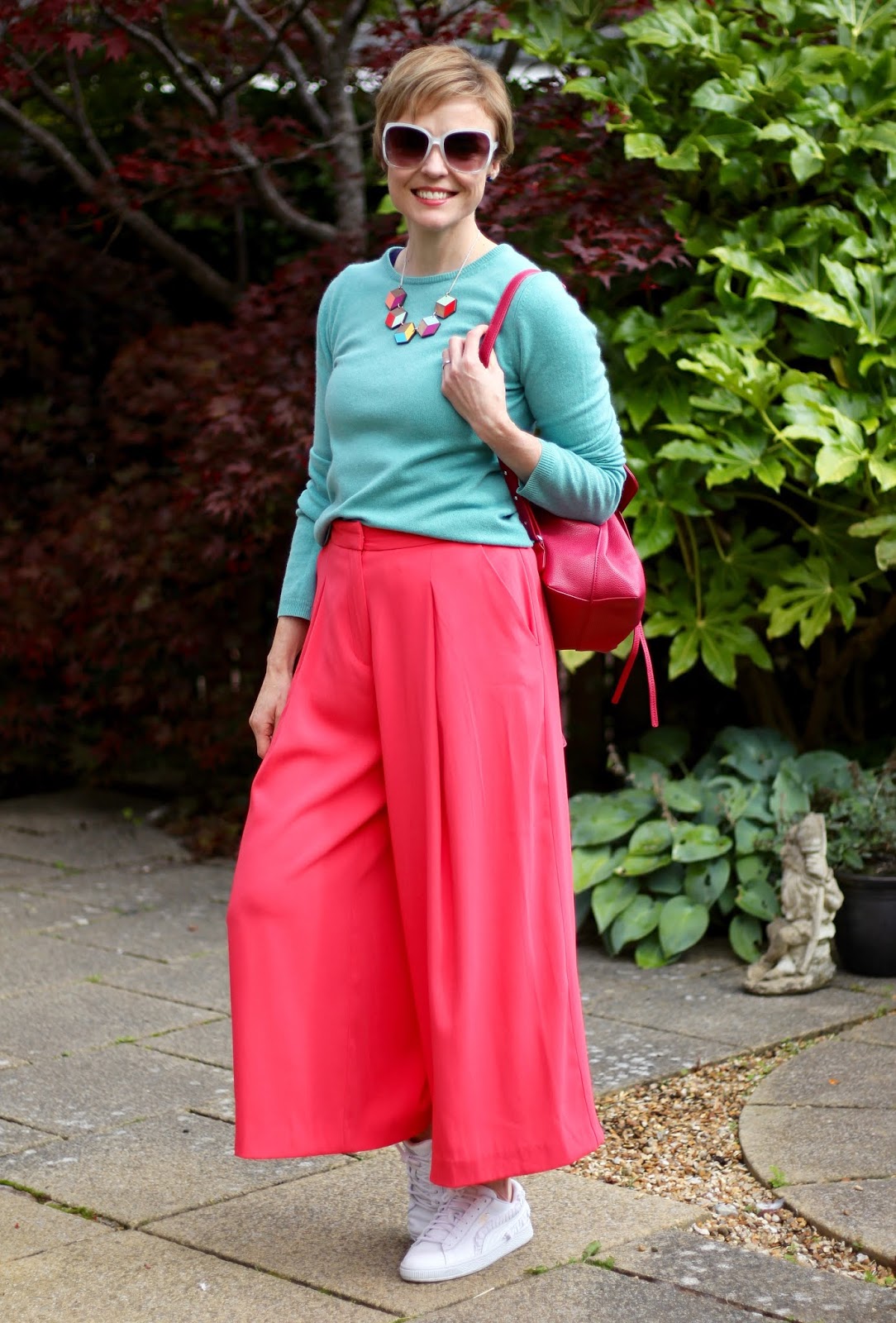 Styling baggy neon pink culottes and an aqua cashmere knit | Fake Fabulous