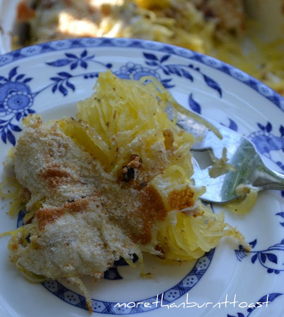 spaghetti squash on a plate with cheese