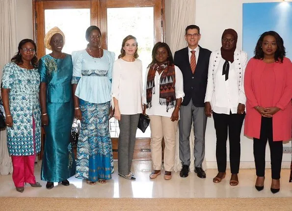Queen Letizia wore Massimo Dutti large plaid trousers at Women for Africa Foundation meeting in Dakar