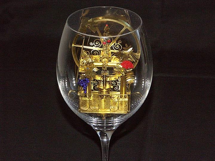 08-Solar-Kinetic-Miniature-Sculptures-in-a-Glass-Goblet-www-designstack-co