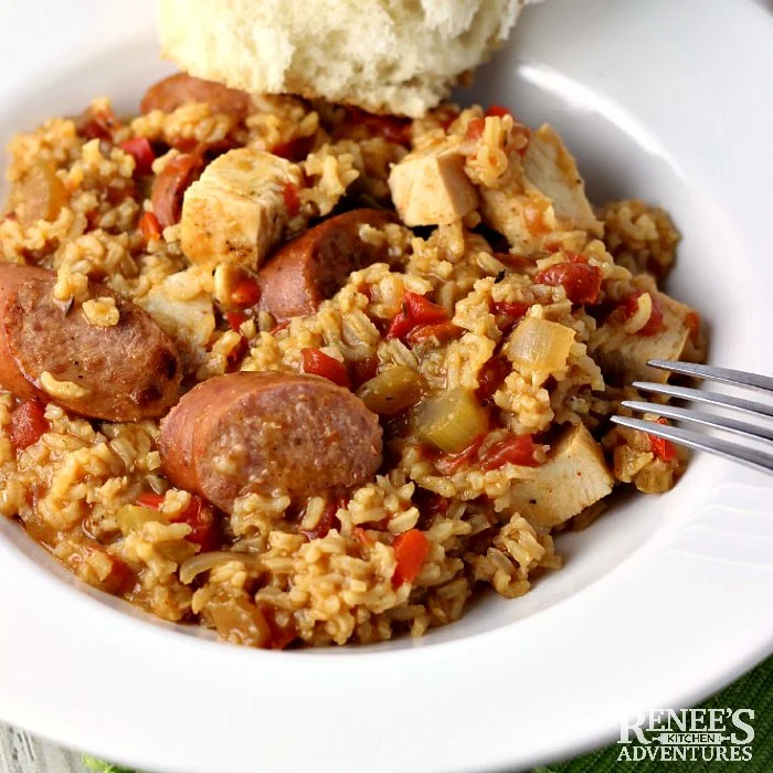 Easy One Pan Chicken and Sausage Jambalaya in white bowl, close up