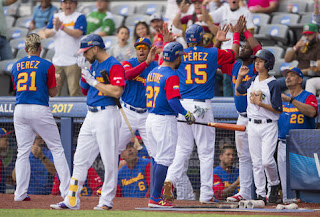Venezuela se aferró a su tórrida ofensiva y venció 11-10 a Italia en un duelo de bateo