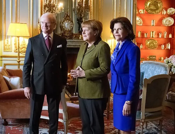 King Carl Gustaf and Queen Silvia met with German Chancellor Angela Merkel at Royal Palace in Stockholm