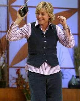 Ellen DeGeneres dancing with arms waving