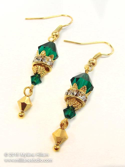 Swarovski emerald and gold drop earrings for special occasions and bridal wear